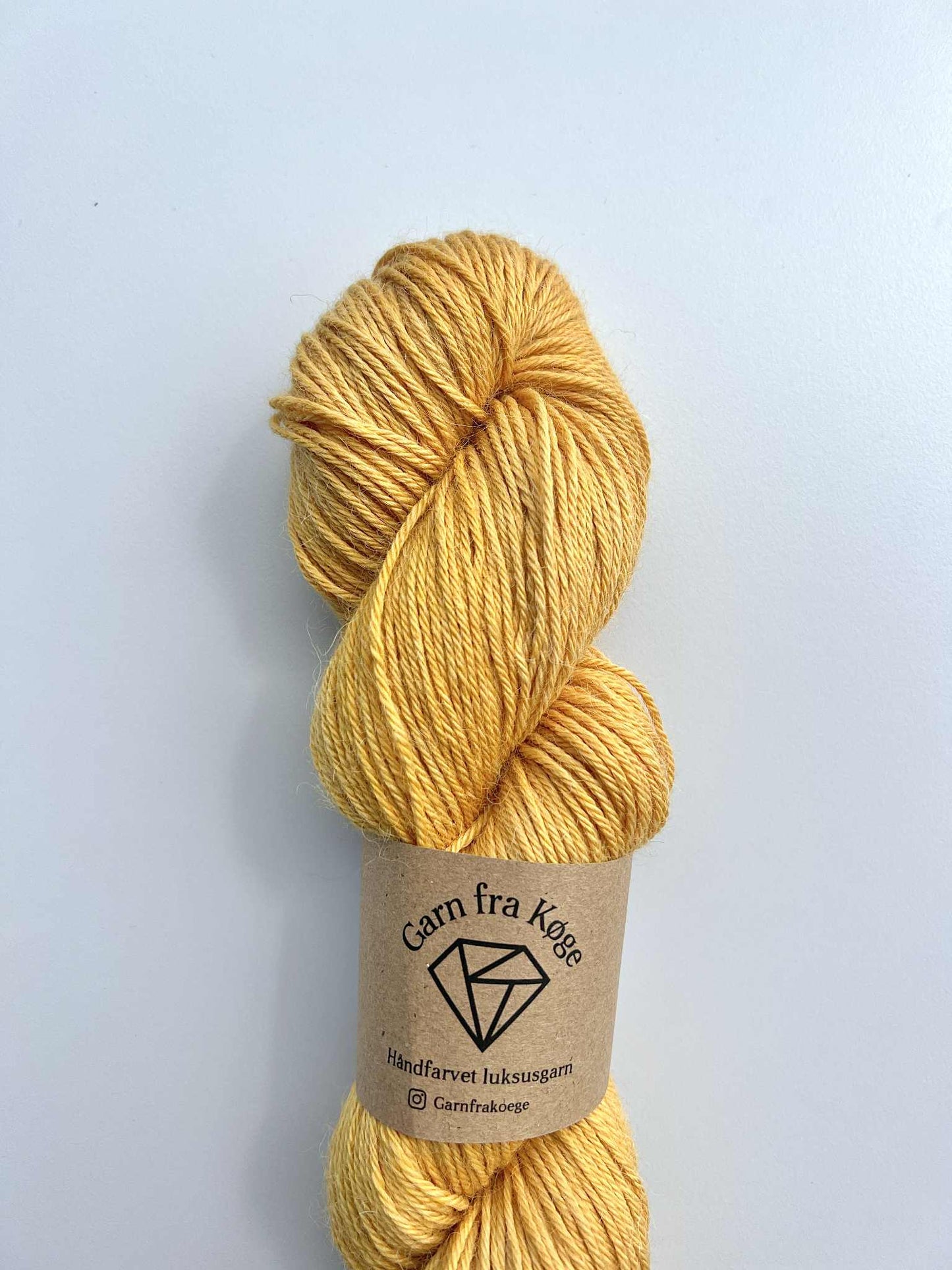 Garn fra Køge Plantefarvet Alpaca/silk farve: Løg